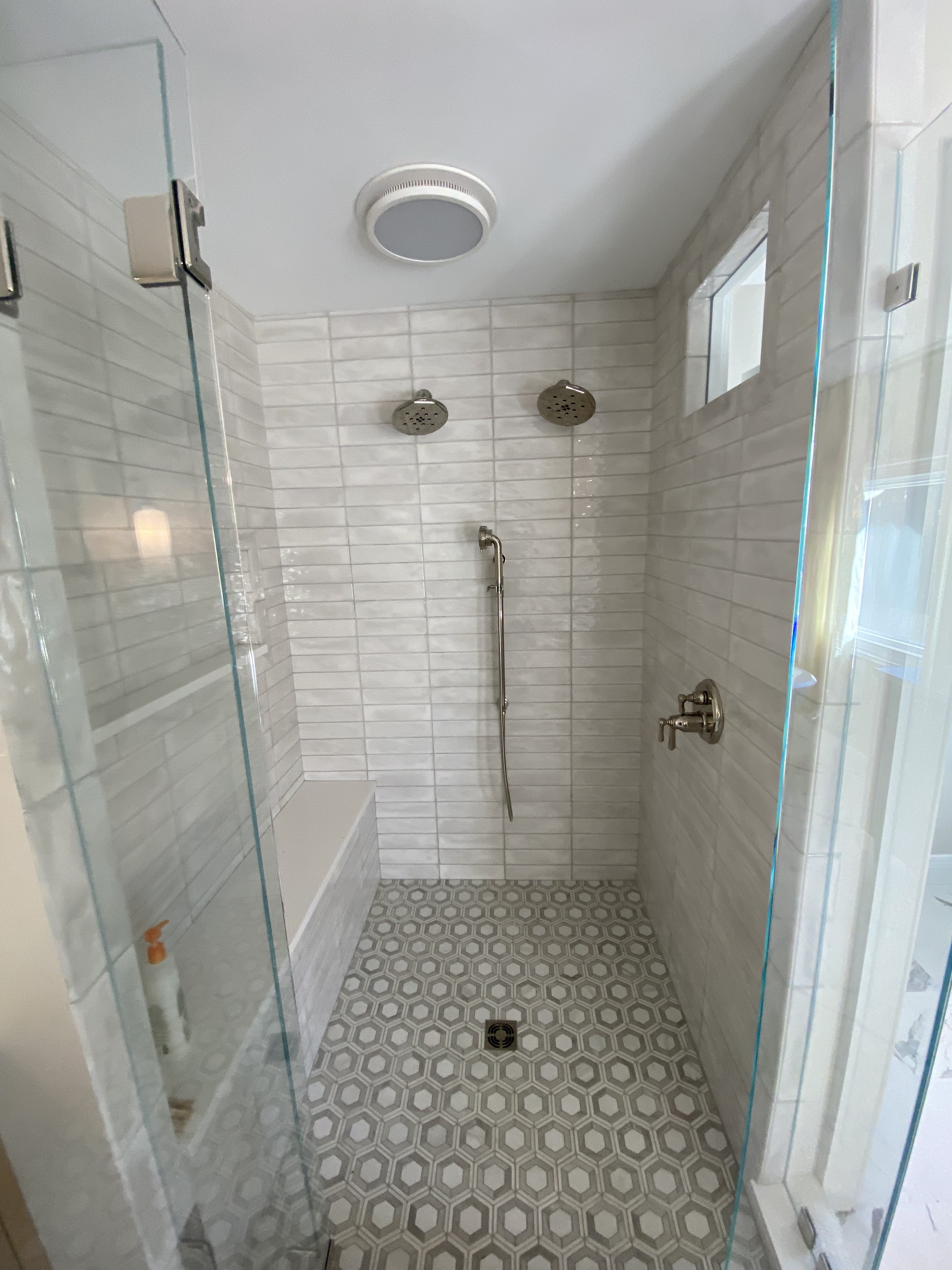 Rolling Hills bathroom — shower detail with dual rain heads and subway tile surround